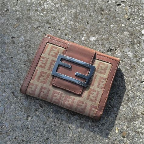 fendi face bi fold wallet|fendi zucchino wallet.